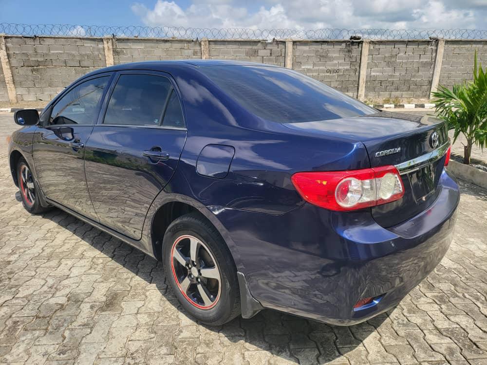 Toyota Corolla side view after delivery in Nigeria