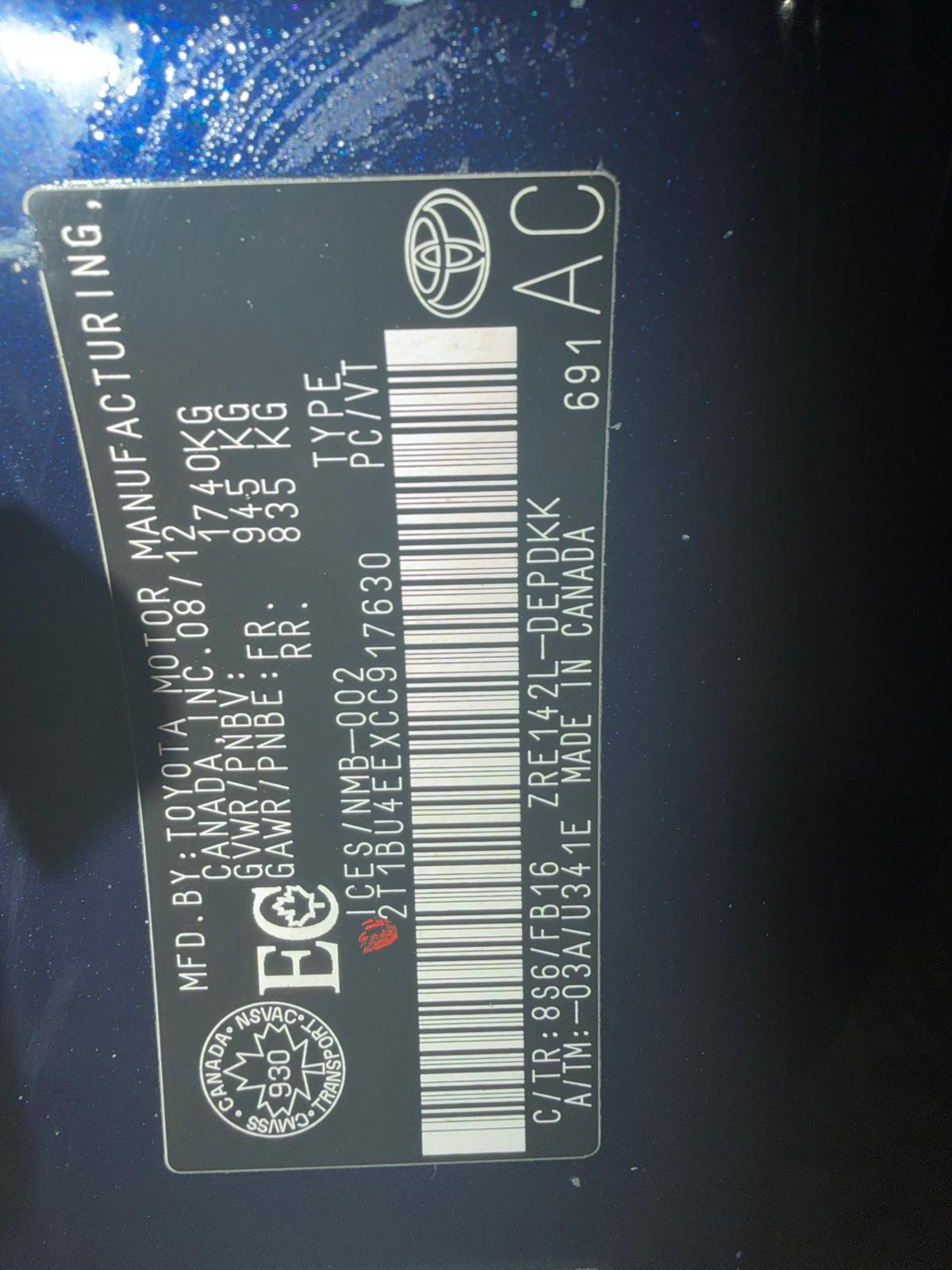 Manufacturer label showing the vehicle was made in Canada